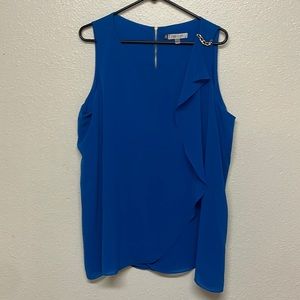 Blue dressy sleeveless blouse with gold accents and ruffle